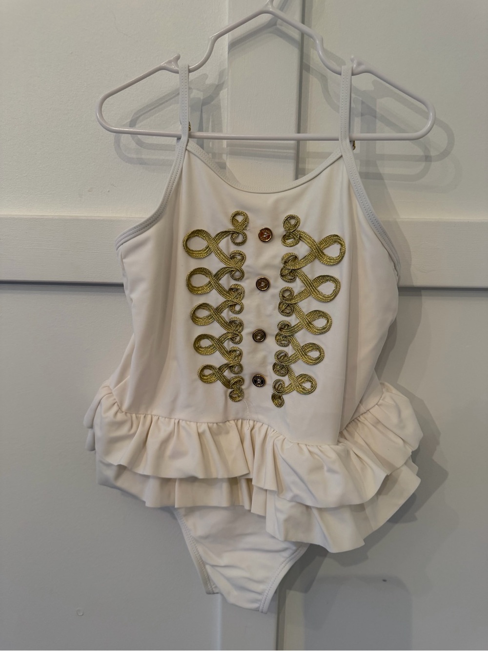 Girls Cream Ruffled One-Piece Swimsuit with Gold Embellishment